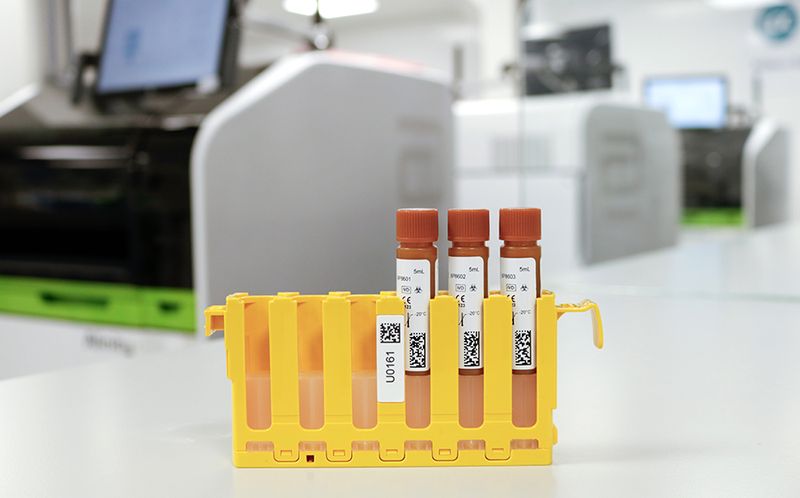 A technologist pipettes from Multichem IA Plus vial